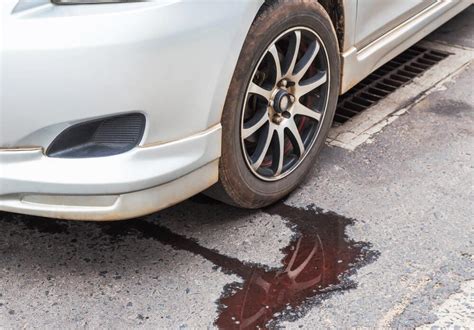 car is leaking red fluid|Leaking bright red from under the car :。